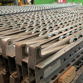 99"L x 2 7/8"W x 2 5/8"H Used Pallet Flow Rail with Stops